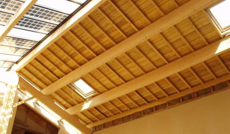 Pannes lamellées collées                  véranda Bio climatique